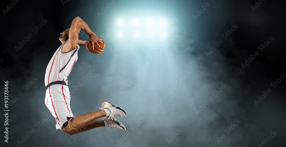 Fototapeta premium Caucassian Basketball Player in dynamic action with ball in a pr
