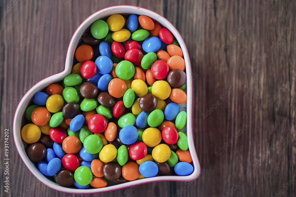 Round candy in a multicolored glaze. Round candy in a multicolored glaze.