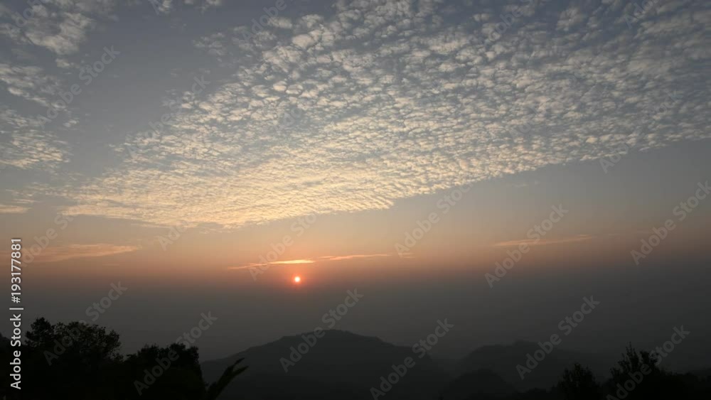 Timelapse 4k video of beautiful sunrise with movement cloud and silhouette mountain background Timelapse 4k video of beautiful sunrise with movement cloud and silhouette mountain background