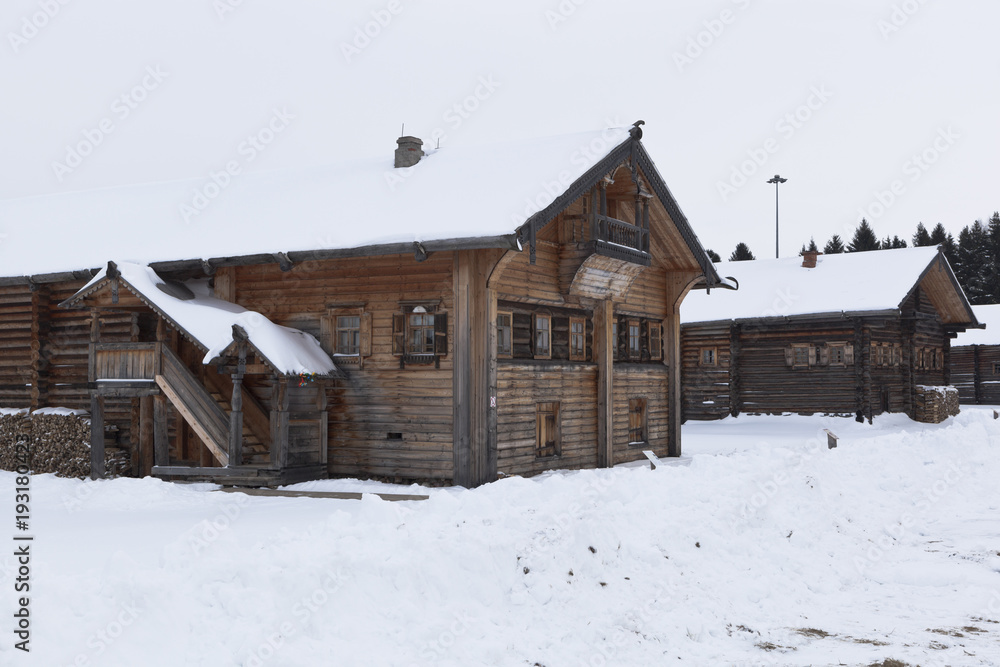 Old village houses in the Museum of Wooden Architecture in the village of Semenkovo, Vologda region