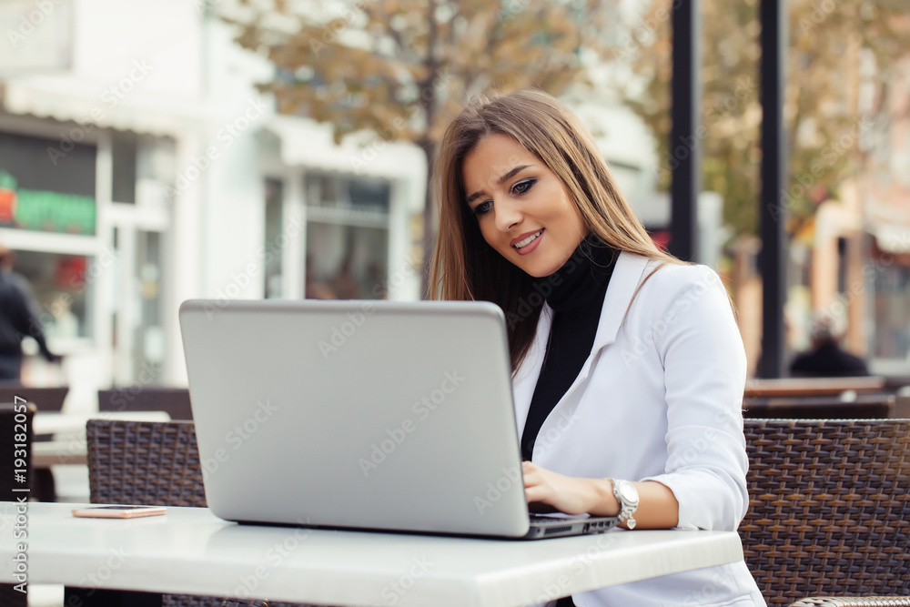 Woman working with a laptop Woman working with a laptop