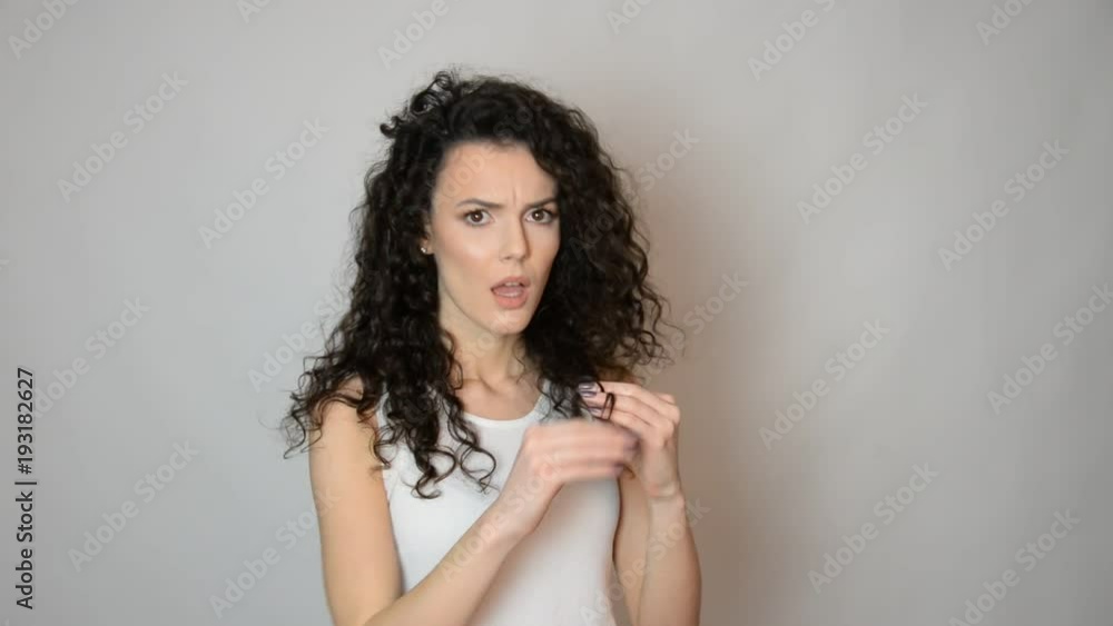 beautiful girl with long curly hair holding scissors haircut concept isolated on background studio beautiful girl with long curly hair holding scissors haircut concept isolated on background studio