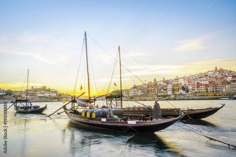 Downtown cityscape by Douro river with old boats, Porto, Portugal
