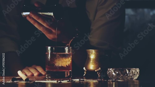 Barman make a cocktail