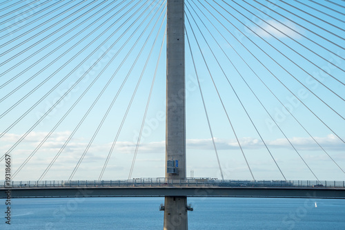 Fototapeta Naklejka Na Ścianę i Meble -  The new Queensferry Crossing Bridge, viewed from the west footpath of the old Forth Road Bridge, showing the cable-stayed construction.