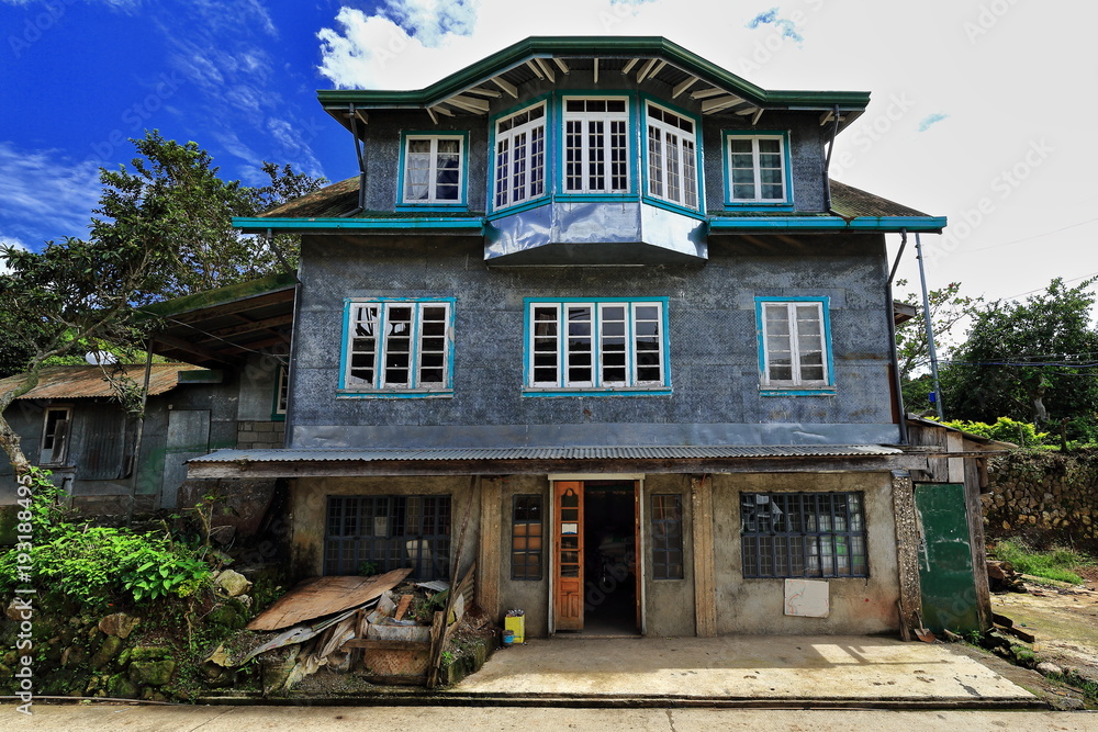 Filipino vernacular architecturegrey house beside the S.Road. Sagada