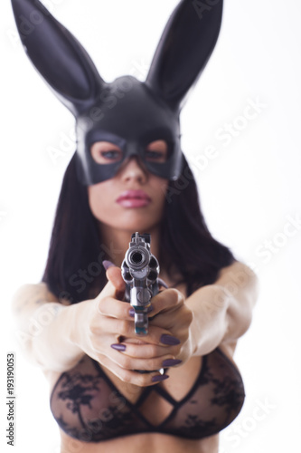 Bunny with gun in lingerie Sexy Woman In Black Lingerie With Bunny Mask Posing With A Gun Stock Photo Adobe Stock