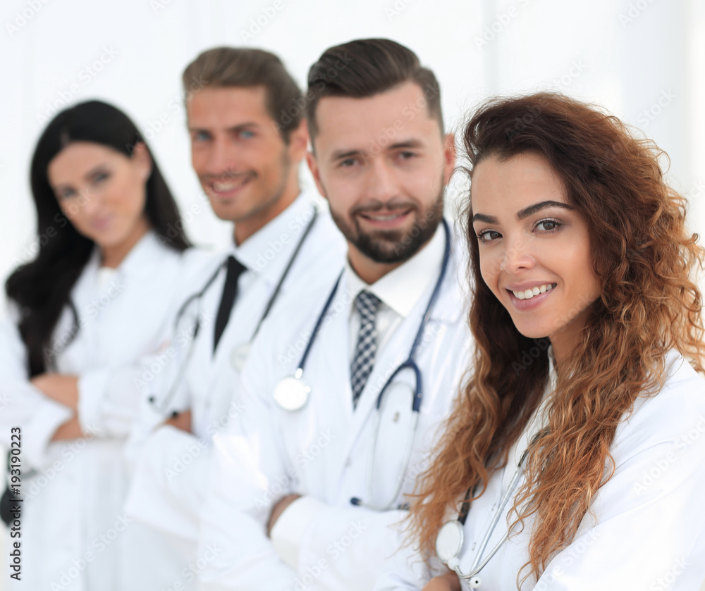 portrait of female doctors with colleagues portrait of female doctors with colleagues
