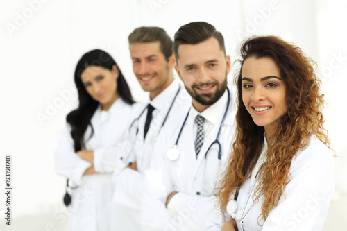 portrait of female doctors with colleagues