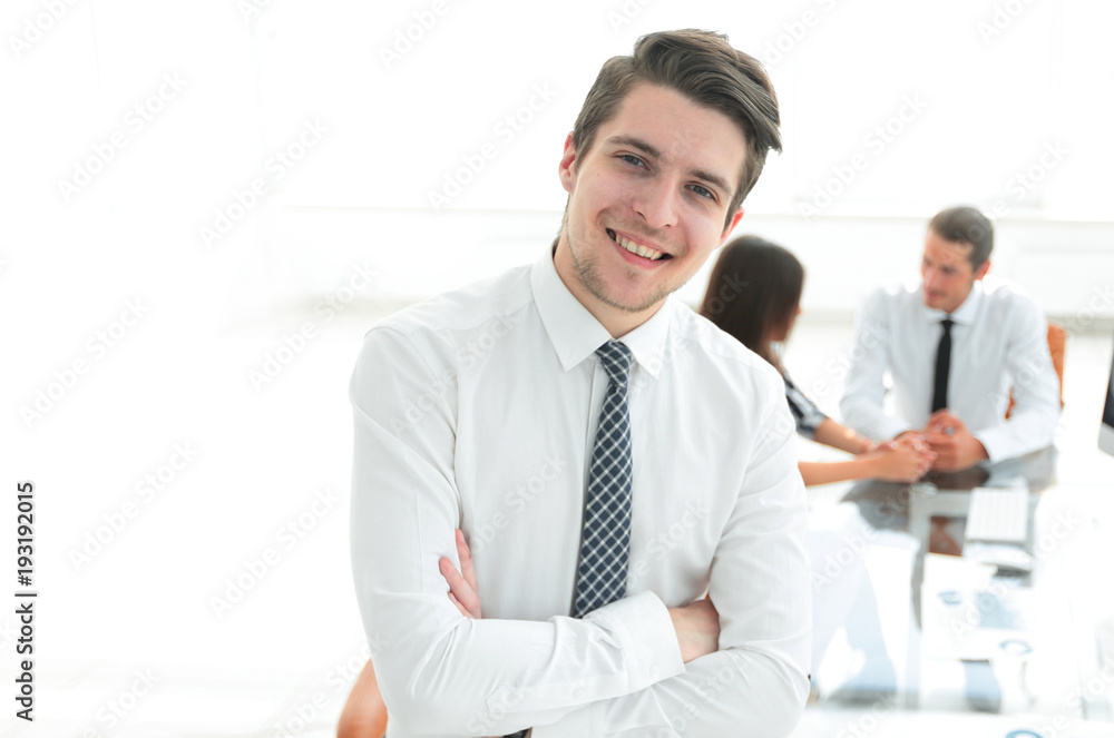 successful businessman on background of office. successful businessman on background of office.