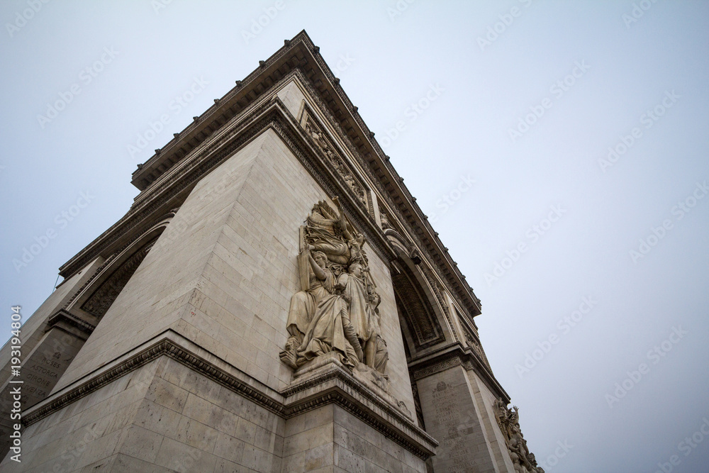  Arc de Triomphe (Triumph Arch) on place de l'Etoile in Paris, taken from below. It is one of the most famous monuments in Paris, standing on Champs Elysees on  center of Place Charles de Gaulle..