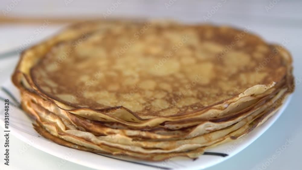 spread the prepared pancake on a plate spread the prepared pancake on a plate