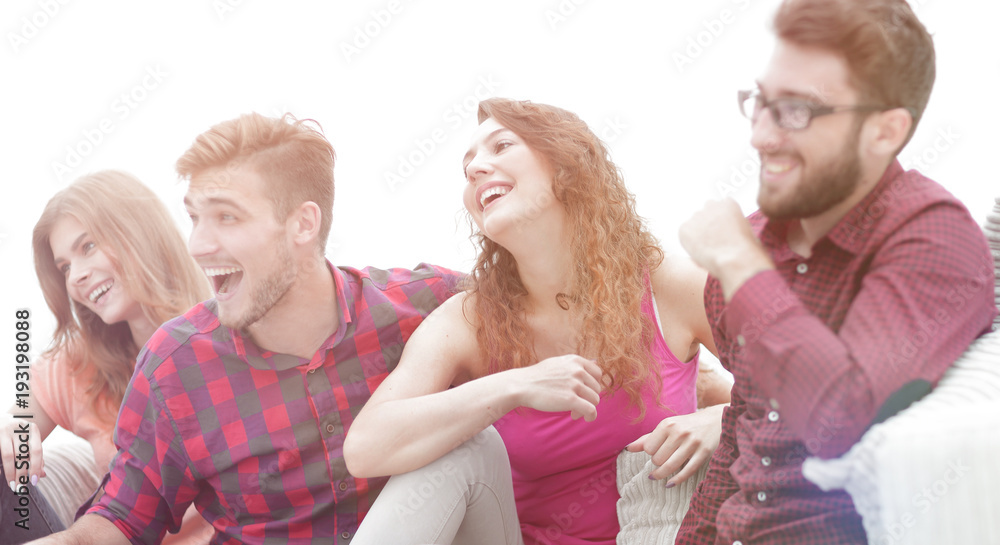 young people watch your favorite show sitting on the couch. young people watch your favorite show sitting on the couch.