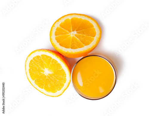 Orange juice glass and orange slices on a white background