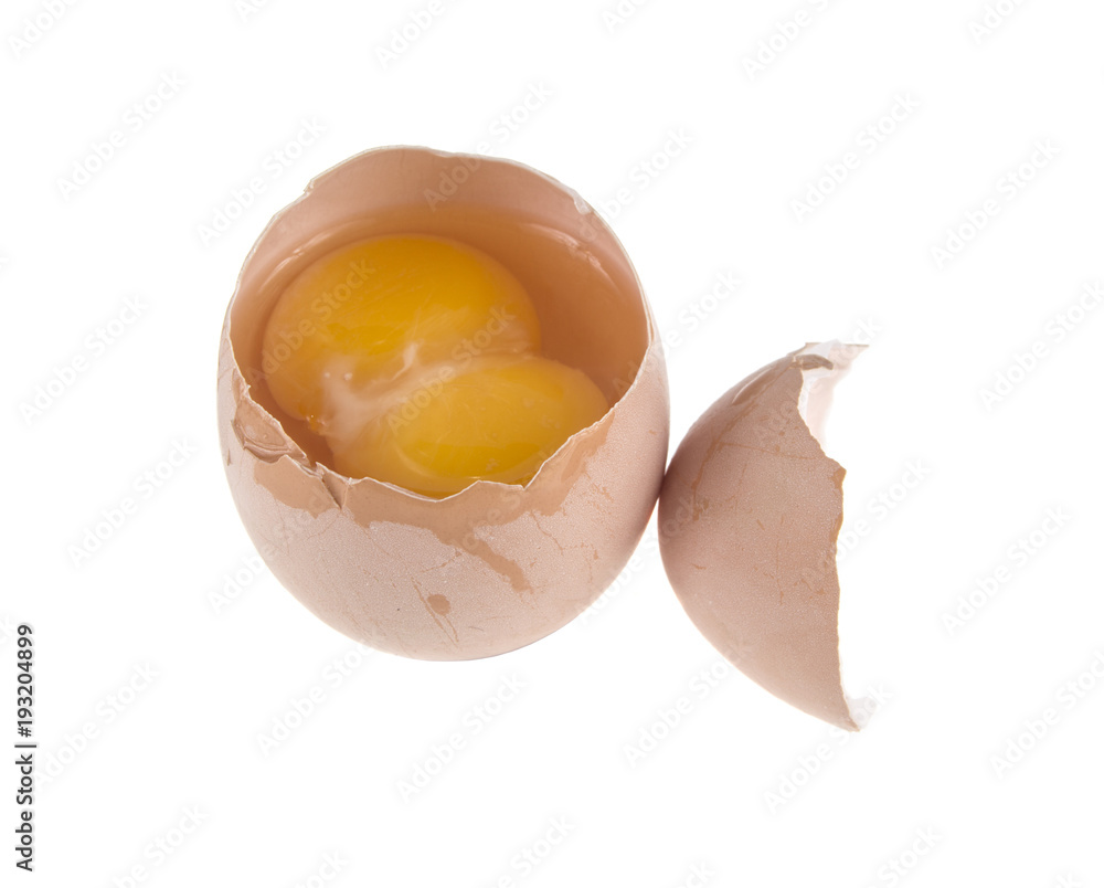 egg and two yolks on isolated white background egg and two yolks on isolated white background