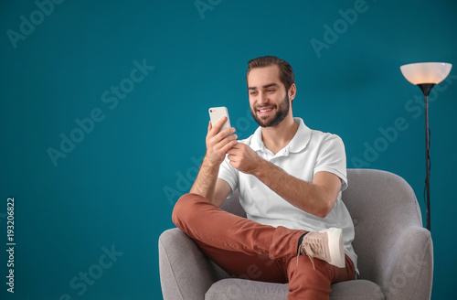 Handsome man with mobile ph...