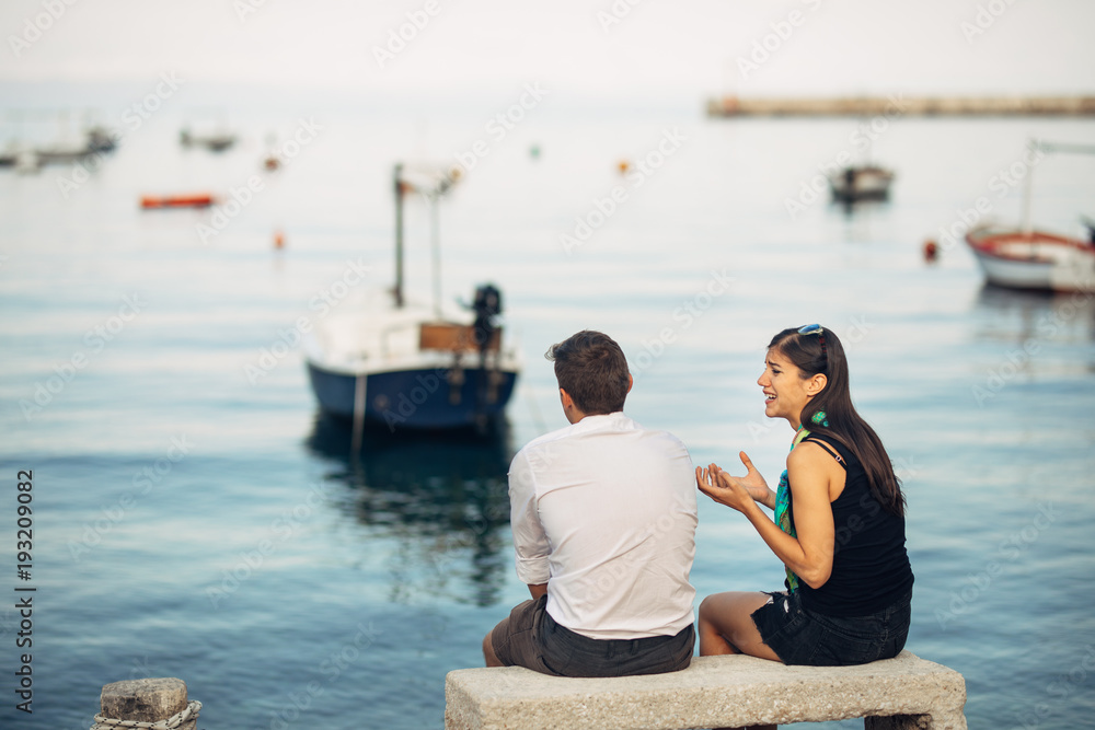 Romantic couple having relationship problems.Woman crying and begging a man.Fisherman life,dangerous occupation.Navy sailors relationship.Dating a sailor.Saying goodbye.Emotional farewell.Break up. Romantic couple having relationship problems.Woman crying and begging a man.Fisherman life,dangerous occupation.Navy sailors relationship.Dating a sailor.Saying goodbye.Emotional farewell.Break up.