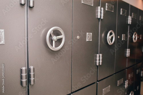 Old retro several safes. Horizontal, closeup view 