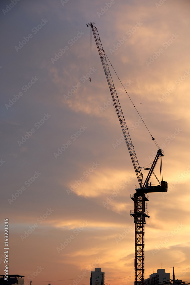 Tower crane on the sunset Tower crane on the sunset