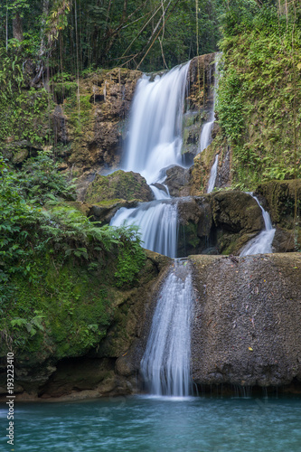 Scenic waterfalls and lush vegetation in Jamaica