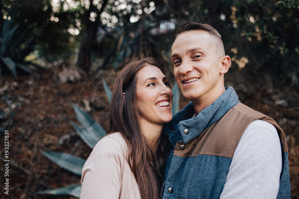 Fototapeta premium Wife looking lovingly at her husband