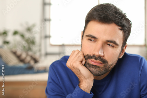 Young bearded man in casual...