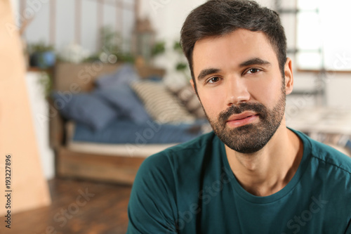 Young bearded man in casual...