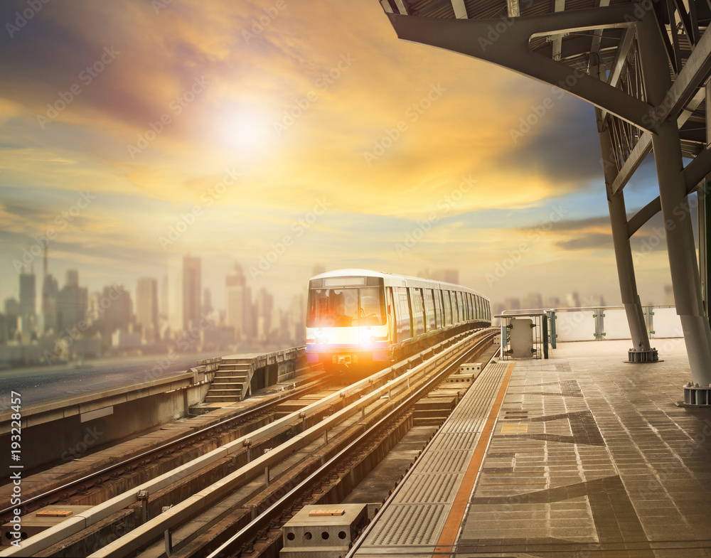 Fototapeta premium sky trains and mass transportation station with modern building in city background