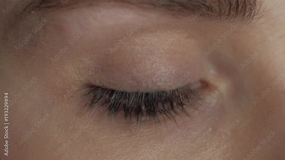 The female make makeup on her eyes. Macro footage. 4k The female make makeup on her eyes. Macro footage. 4k