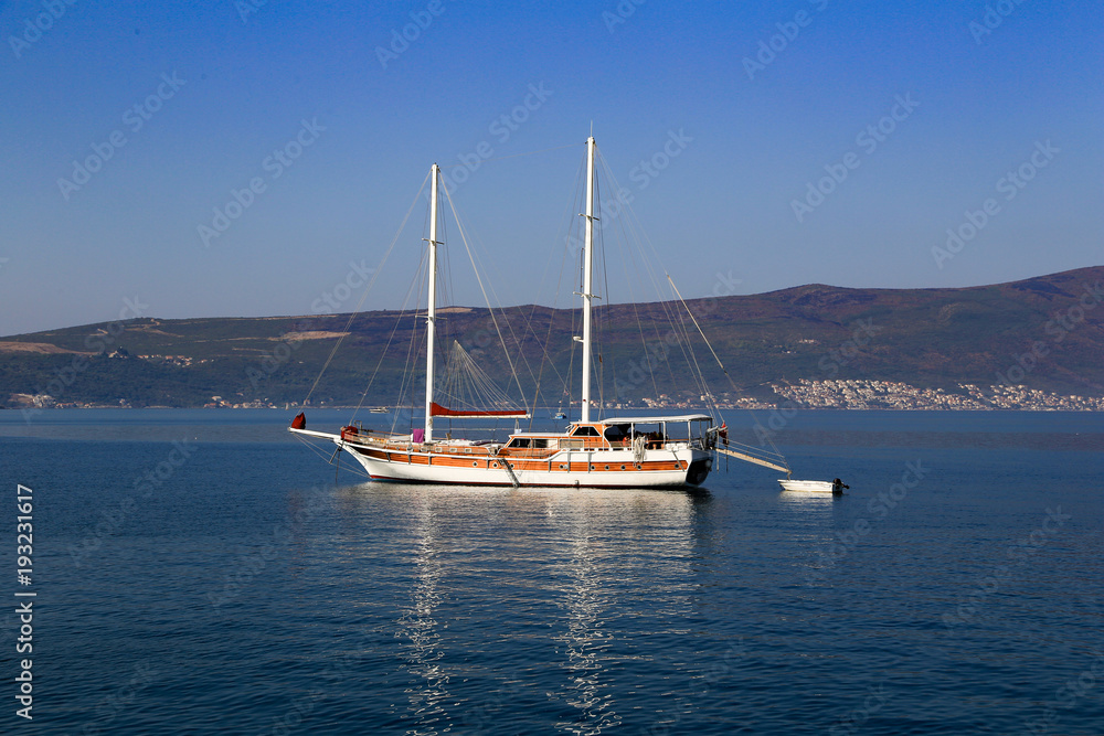 Sailing yacht with lowered sails