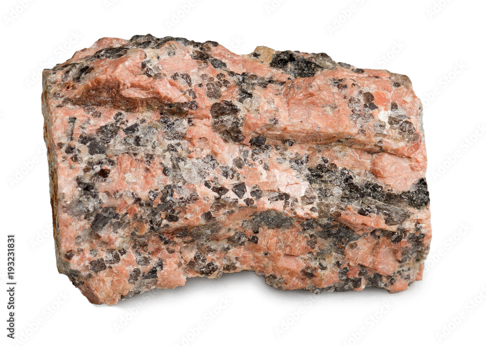 Specimen of red granite mineral isolated on white background