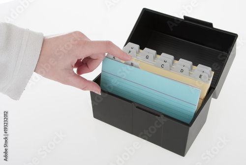 Finger pointing at filing box