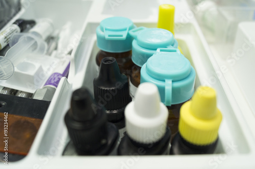 Various instruments, medications and painkillers in a dentist's support photo