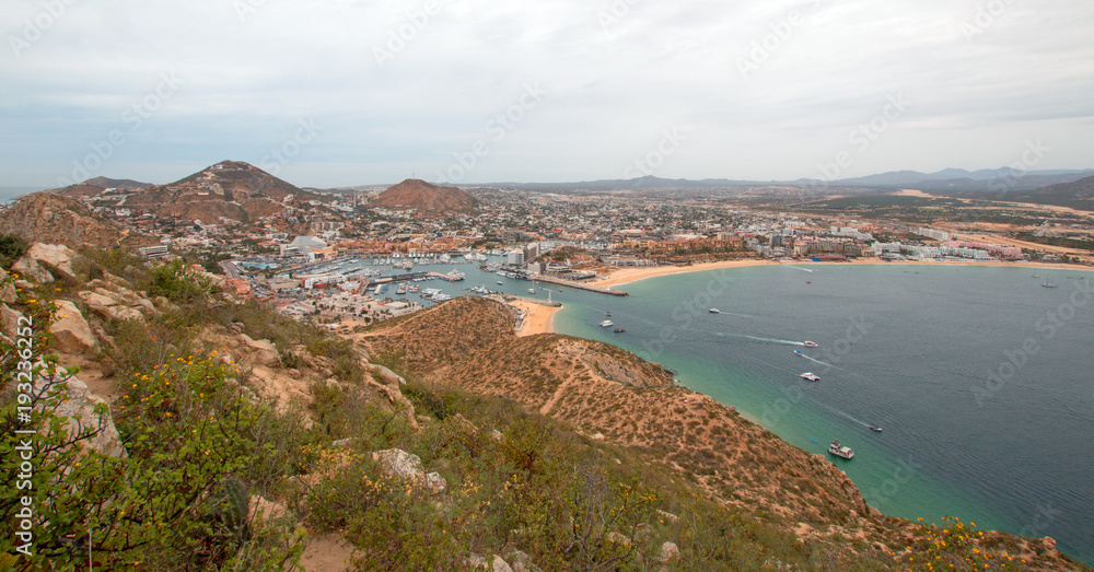 View of Pacific Ocean and Sea of Cortes and Cabo San Lucas marina as seen from the top of the Mount Solmar hiking trail in Baja California Mexico BCS