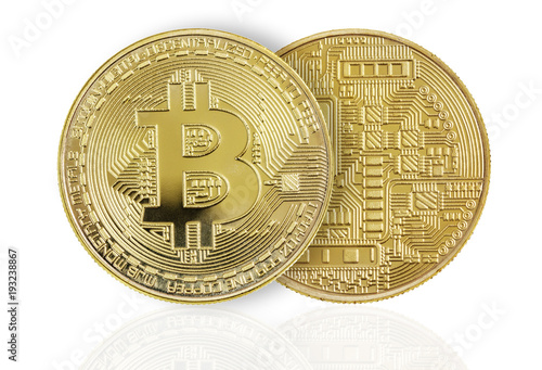 Two golden bitcoins on whit...