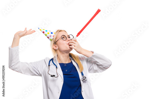 Woman doctor in white coat with party stuff photo