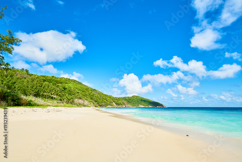 tropical Beach Police Bay (white sand and turquoise sea) , south of Mahe, Seychelles