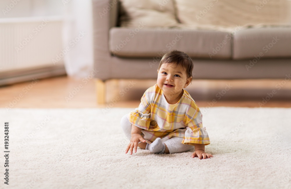 happy smiling baby girl sitting on floor home happy smiling baby girl sitting on floor home