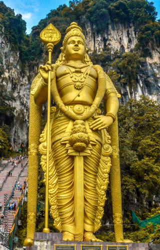 Lord Murugan Statue - Batu Caves is a limestone hill that has a series of caves and cave temples in Gombak, Selangor, Malaysia. It takes its name from the Sungai Batu, which flows past the hill.