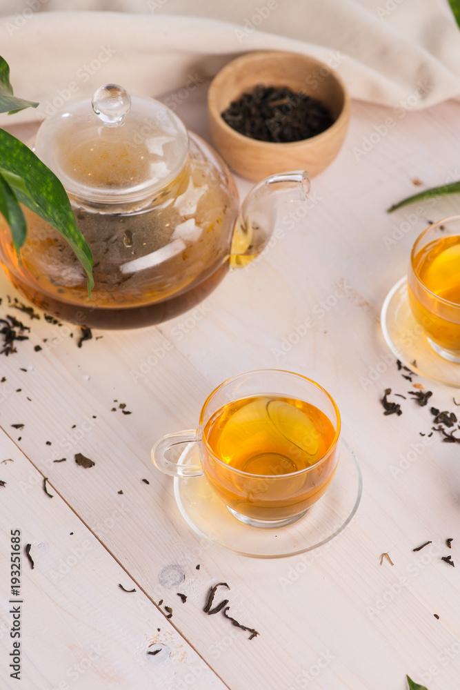 Cups of tea on wooden table background Cups of tea on wooden table background