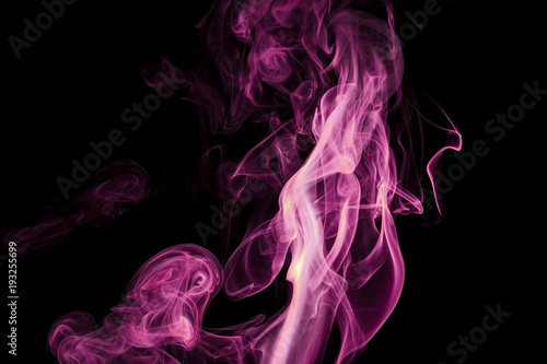 Purple smoke on black background