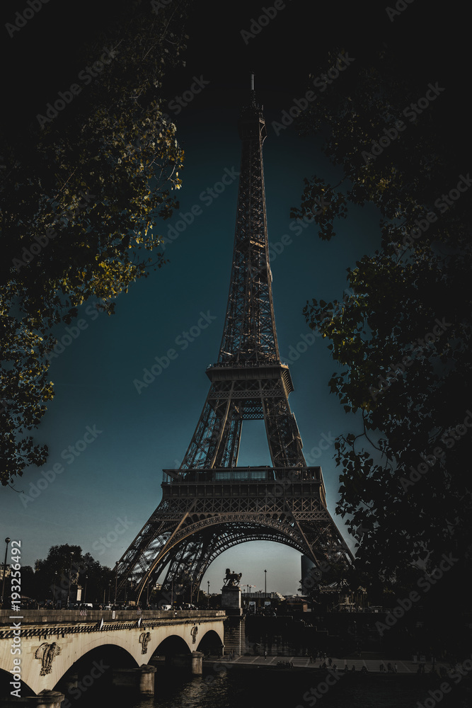 Darkened vertical picture of Eiffel Tower