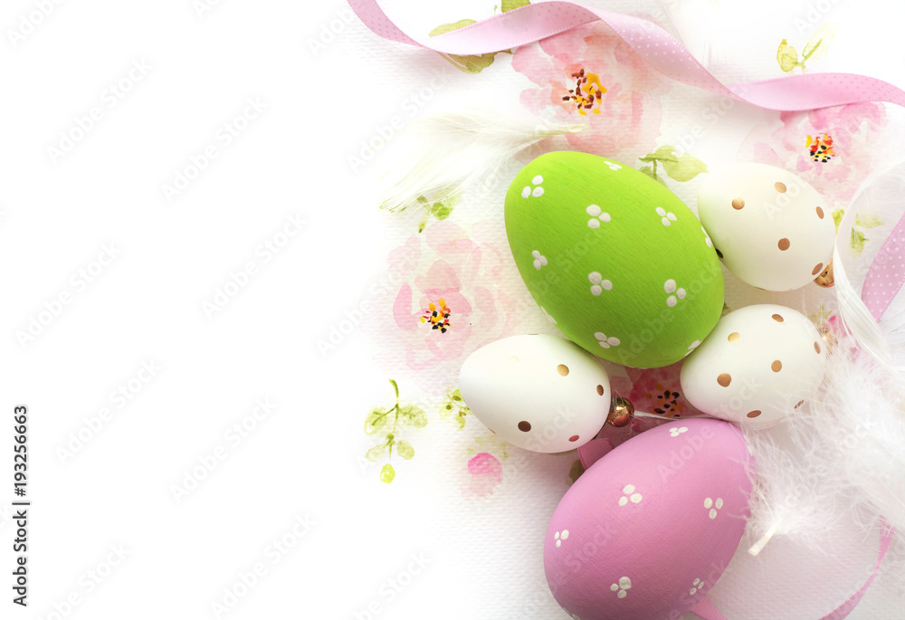 easter eggs and watercolor flowers on white background