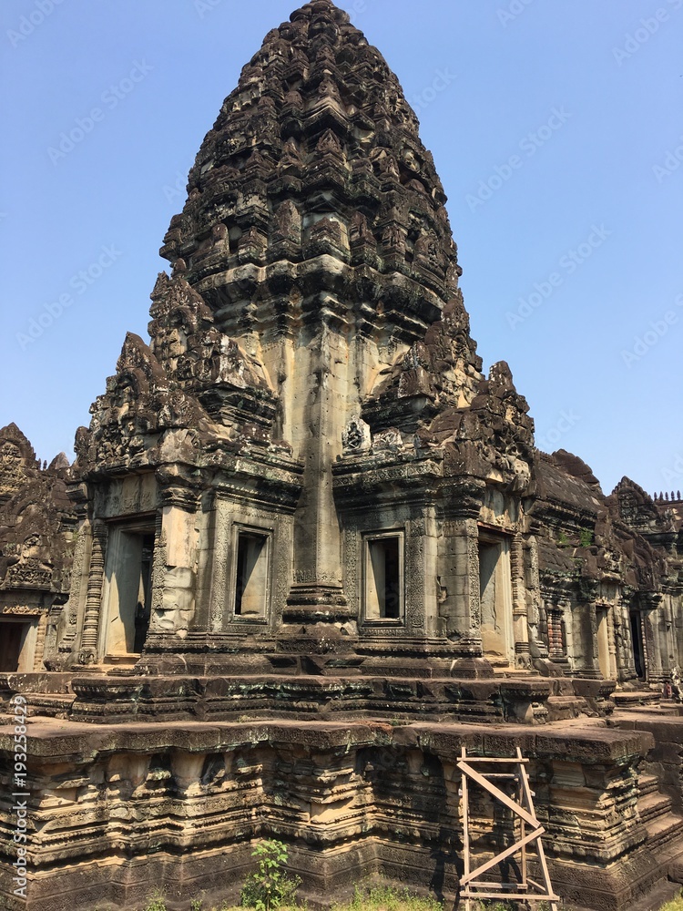 Angkor Wat in Siem Reap, Cambodia. Ancient Khmer stone temple ruins in jungle forest