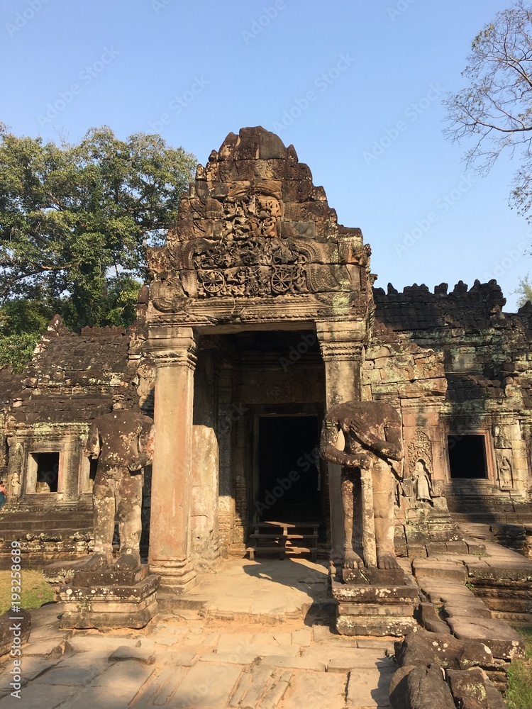Angkor Wat in Siem Reap, Cambodia. Ancient Khmer stone temple ruins in jungle forest