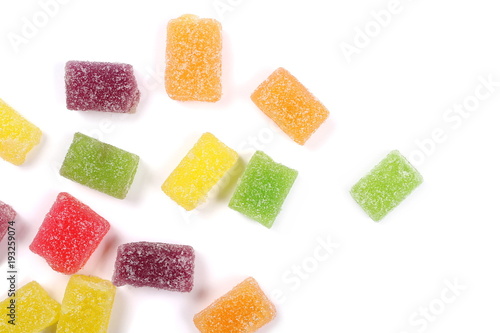 Colorful jelly sugar candies isolated on white background, top view