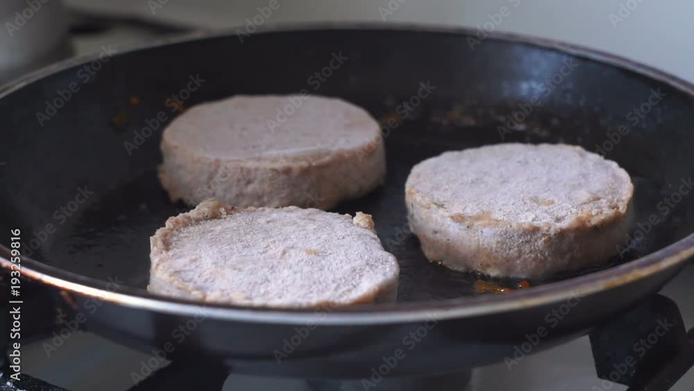 Fried hen meatballs or cutlets in frying pan. Homemade cutlets. Fried hen meatballs or cutlets in frying pan. Homemade cutlets.