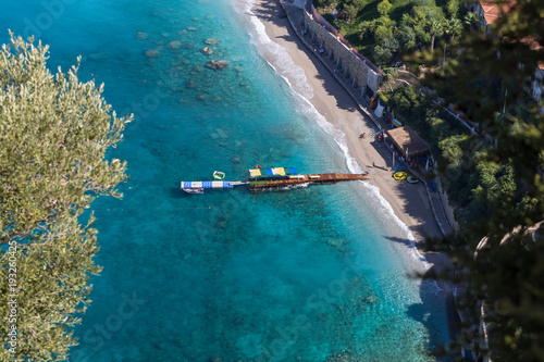 Birds Eye View of a Dock on Turquoise Sea