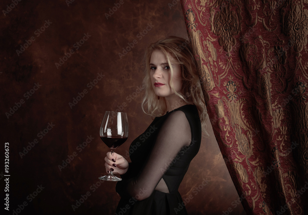 Portrait of beautiful young woman with red wine. Portrait of beautiful young woman with red wine.