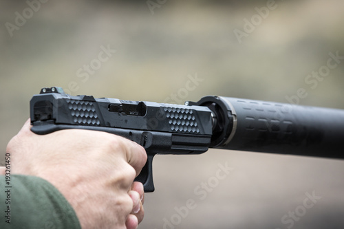 Gun with silencer photo